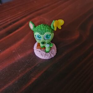 Disney Green and Yellow Action Figure